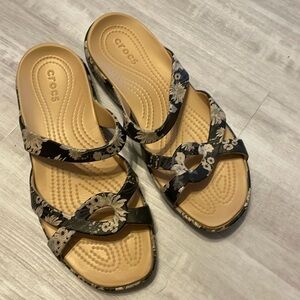 Women’s Marlene crocs, size 10, and black and khaki flower
